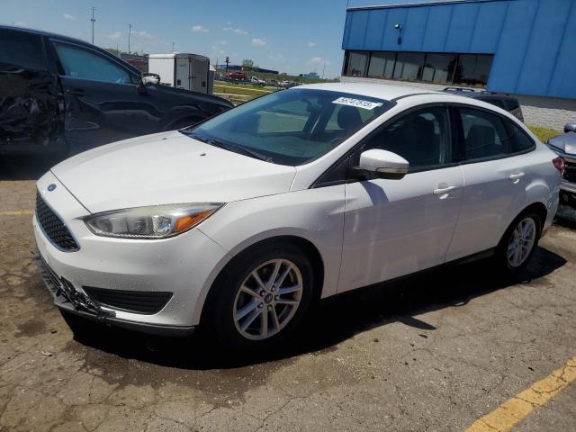 FORD FOCUS SE 2017 with VIN 1FADP3F24HL310871 - Photo from auction