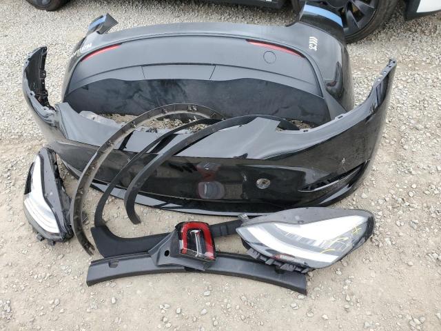 Photo 12 from auction – 2023 TESLA MODEL Y with VIN 7SAYGDEE9PA026554