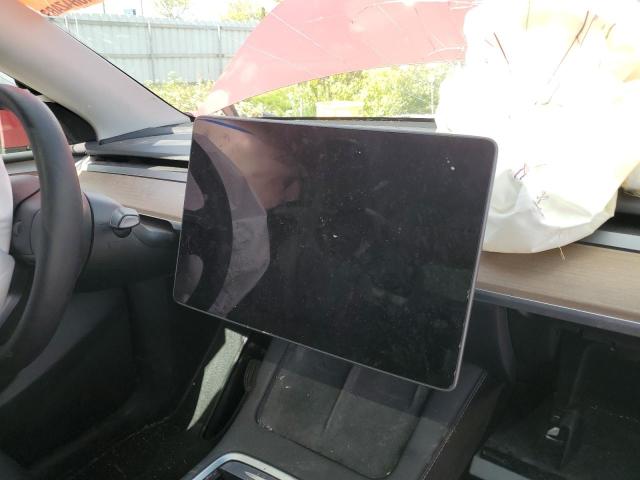 Photo 9 from auction – 2023 TESLA MODEL Y with VIN 7SAYGAEE0PF586299