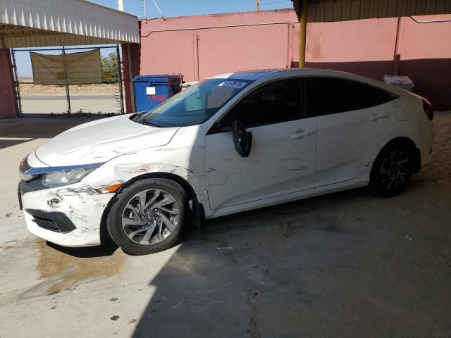 HONDA CIVIC EX 2017 with VIN 2HGFC2F75HH565337 - Photo from auction