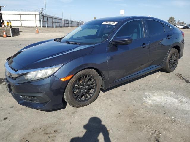 HONDA CIVIC LX 2017 with VIN 2HGFC2F52HH544055 - Photo from auction
