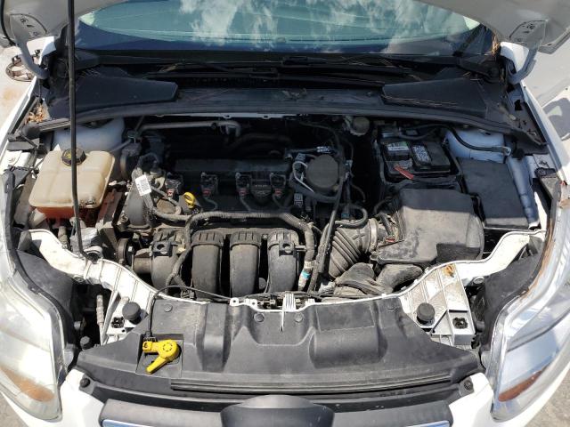 Photo 11 from auction – 2014 FORD FOCUS S with VIN 1FADP3E24EL177073