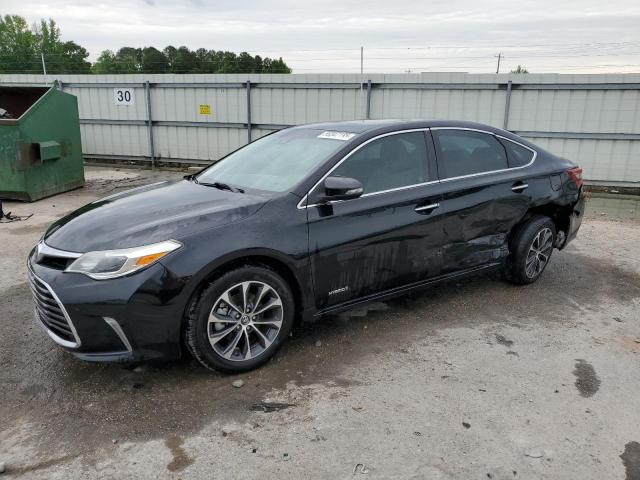 TOYOTA AVALON HYB 2018 with VIN 4T1BD1EB6JU064806 - Photo from auction