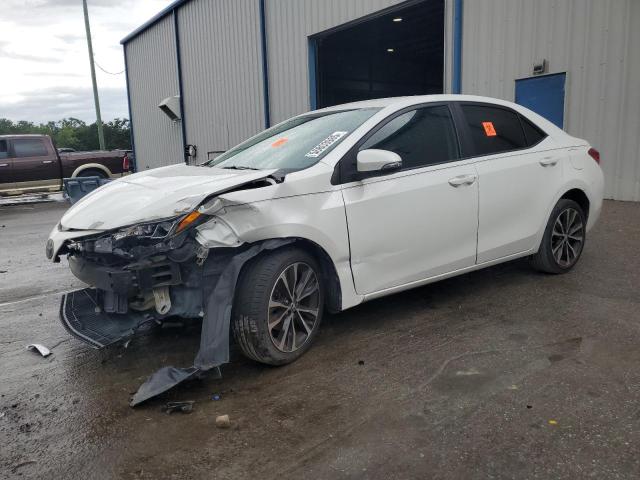 TOYOTA COROLLA L 2018 with VIN 5YFBURHEXJP795339 - Photo from auction