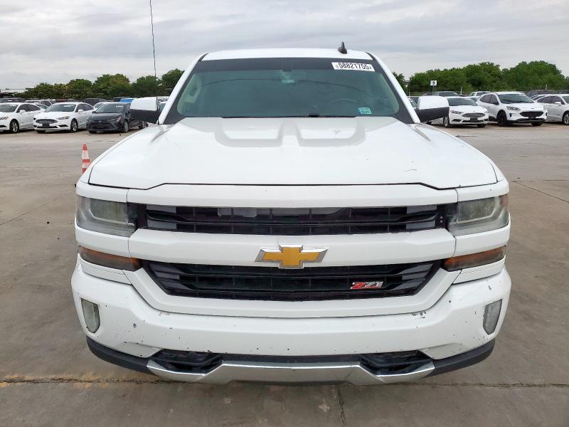 Photo 5 from auction – 2018 CHEVROLET SILVERADO with VIN 3GCUKREC2JG572445