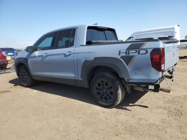 Photo 2 from auction – 2022 HONDA RIDGELINE with VIN 5FPYK3F73NB029320