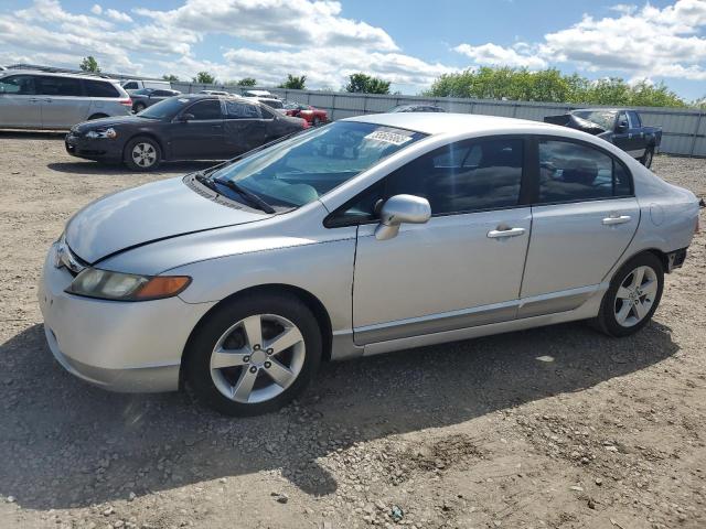 HONDA CIVIC LX 2011 with VIN 19XFA1F5XBE044095 - Photo from auction