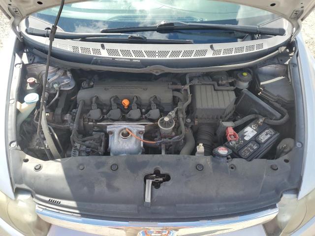 Photo 11 from auction – 2011 HONDA CIVIC LX with VIN 19XFA1F5XBE044095