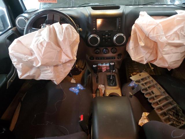 Photo 8 from auction – 2015 JEEP WRANGLER U with VIN 1C4BJWFG7FL559033