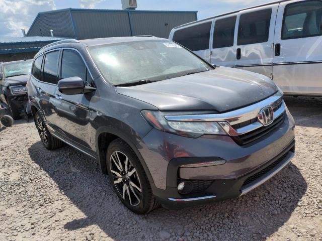 Photo 4 from auction – 2022 HONDA PILOT TOUR with VIN 5FNYF6H62NB048699
