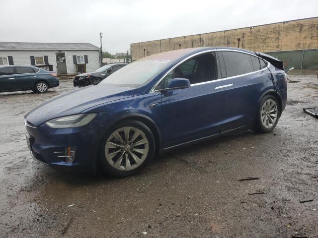 TESLA MODEL X 2017 with VIN 5YJXCDE2XHF067404 - Photo from auction