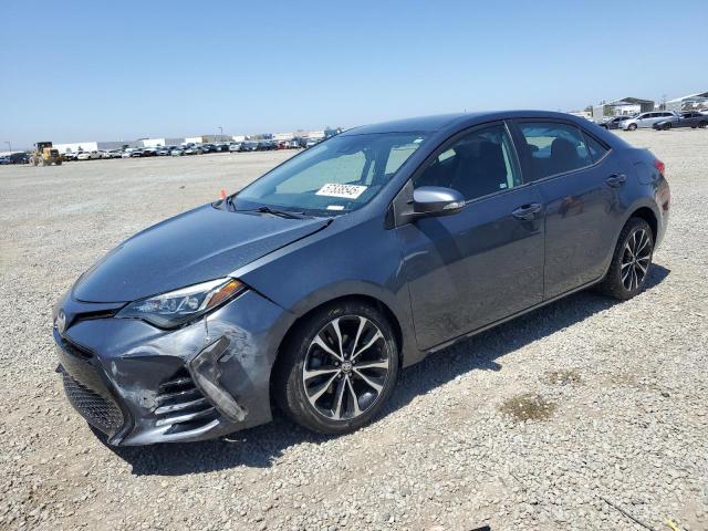 TOYOTA COROLLA 2017 with VIN 5YFBURHE7HP685651 - Photo from auction