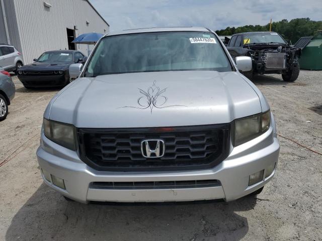 Photo 5 from auction – 2014 HONDA RIDGELINE with VIN 5FPYK1F66EB014516