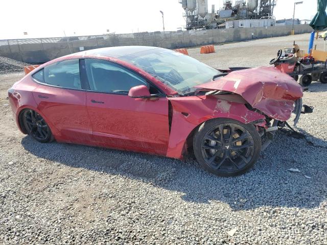 Снимка 4 от търг – 2022 TESLA MODEL 3 с VIN 5YJ3E1EB5NF128080
