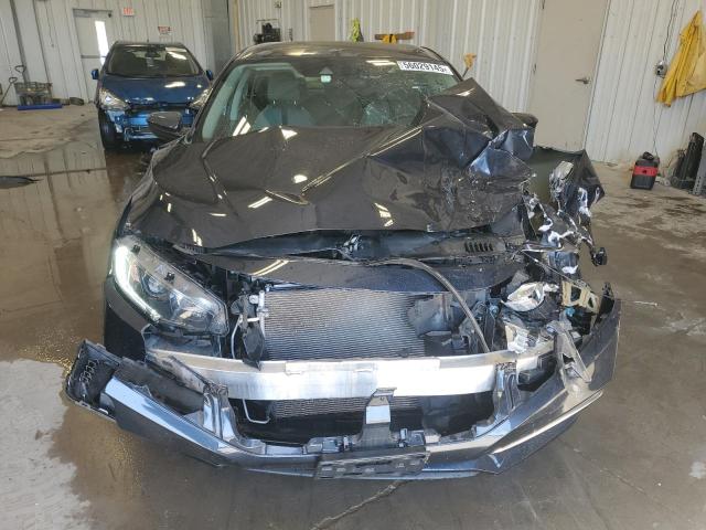 Photo 5 from auction – 2021 HONDA CIVIC LX with VIN 2HGFC2F60MH502941