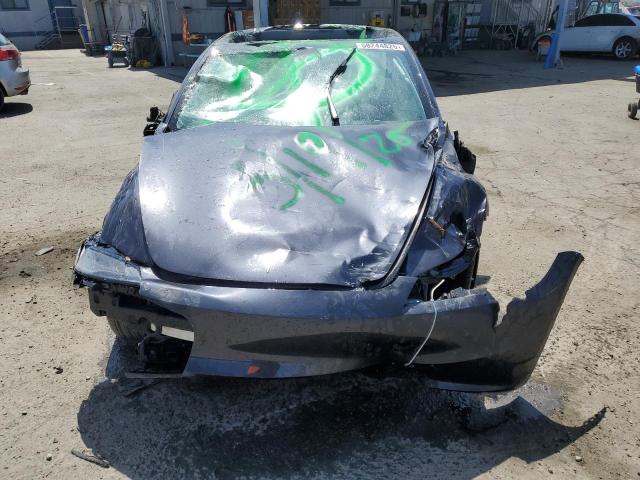 Photo 5 from auction – 2025 TESLA MODEL 3 with VIN 5YJ3E1EA5SF999984