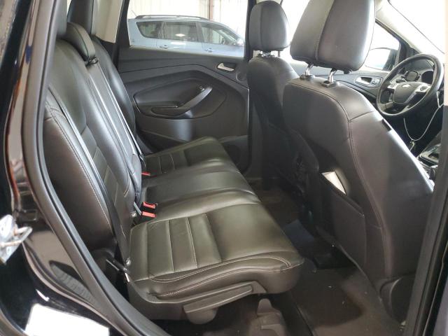 Photo 11 from auction – 2016 FORD ESCAPE TIT with VIN 1FMCU9J95GUC68043