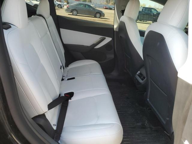 Photo 10 from auction – 2022 TESLA MODEL Y with VIN 7SAYGDEF5NF515610