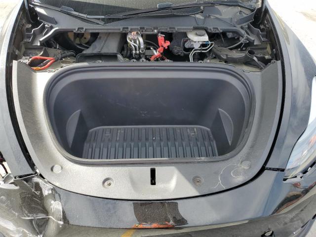 Photo 11 from auction – 2023 TESLA MODEL Y with VIN 7SAYGAEE2PF825495