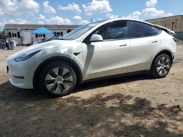 TESLA MODEL Y 2022 with VIN 7SAYGDEE0NA013284 - Photo from auction