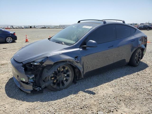 TESLA MODEL Y 2023 with VIN 7SAYGAEEXPF847583 - Photo from auction