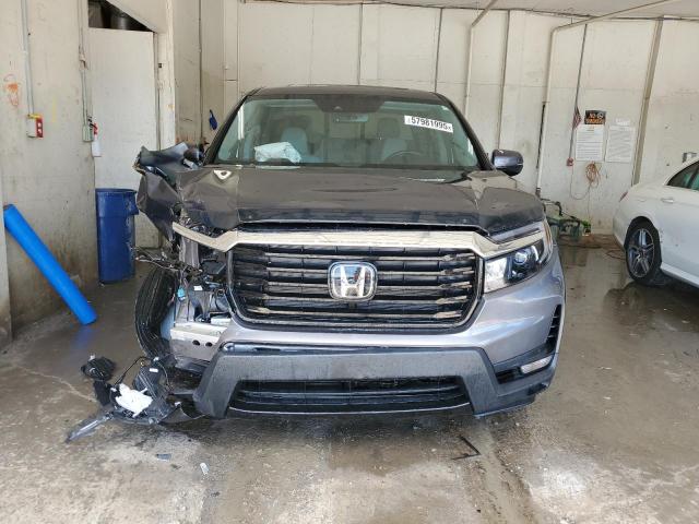 Photo 5 from auction – 2023 HONDA RIDGELINE with VIN 5FPYK3F77PB043319