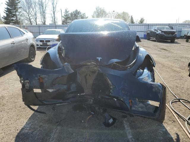 Photo 5 from auction – 2022 TESLA MODEL Y with VIN 7SAYGDEF5NF515610