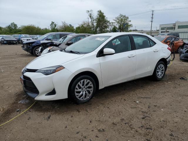 TOYOTA COROLLA L 2017 with VIN 5YFBURHE3HP677823 - Photo from auction