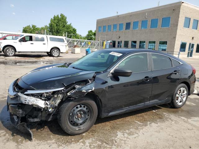 HONDA CIVIC LX 2018 with VIN 19XFC2F58JE027228 - Photo from auction