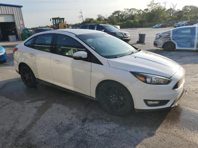 Photo 4 from auction – 2016 FORD FOCUS SE with VIN 1FADP3F24GL235393