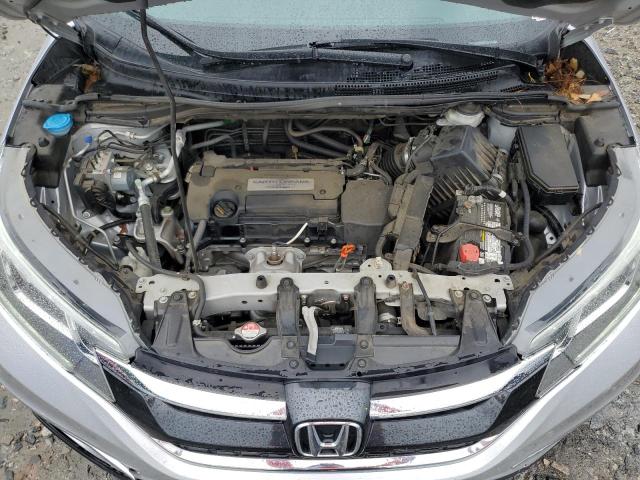 Photo 12 from auction – 2015 HONDA CR-V with VIN 2HKRM3H76FH531035