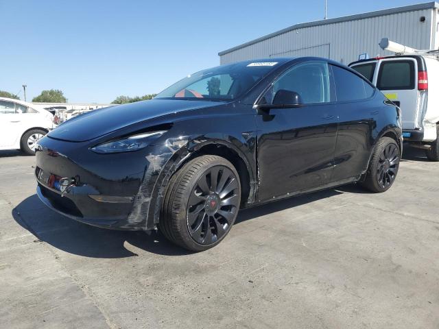 TESLA MODEL Y 2023 with VIN 7SAYGAEE7PF859030 - Photo from auction