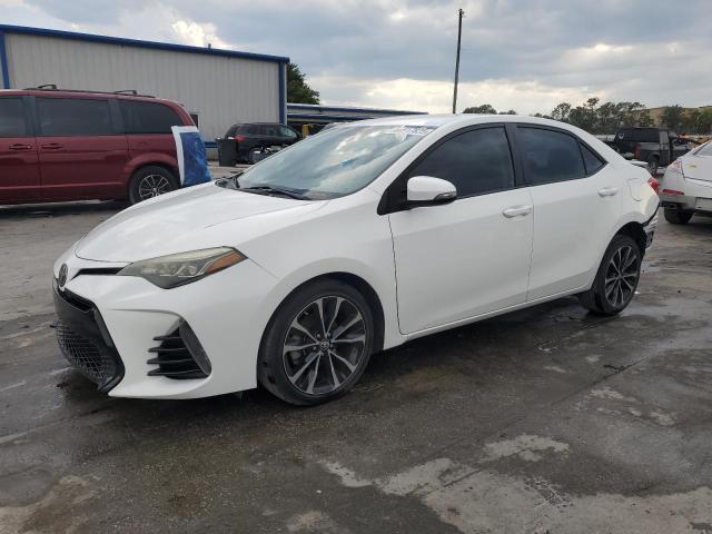 TOYOTA COROLLA L 2017 with VIN 5YFBURHE4HP714894 - Photo from auction
