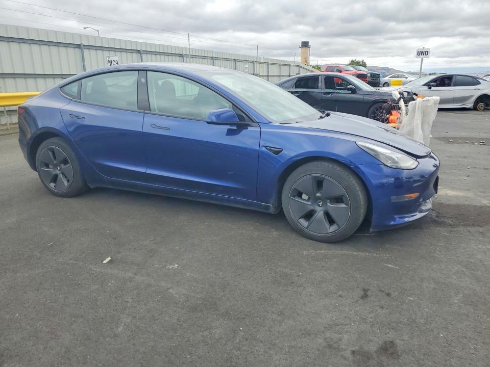 Photo 4 from auction – 2023 TESLA MODEL 3 with VIN 5YJ3E1EA0PF696652