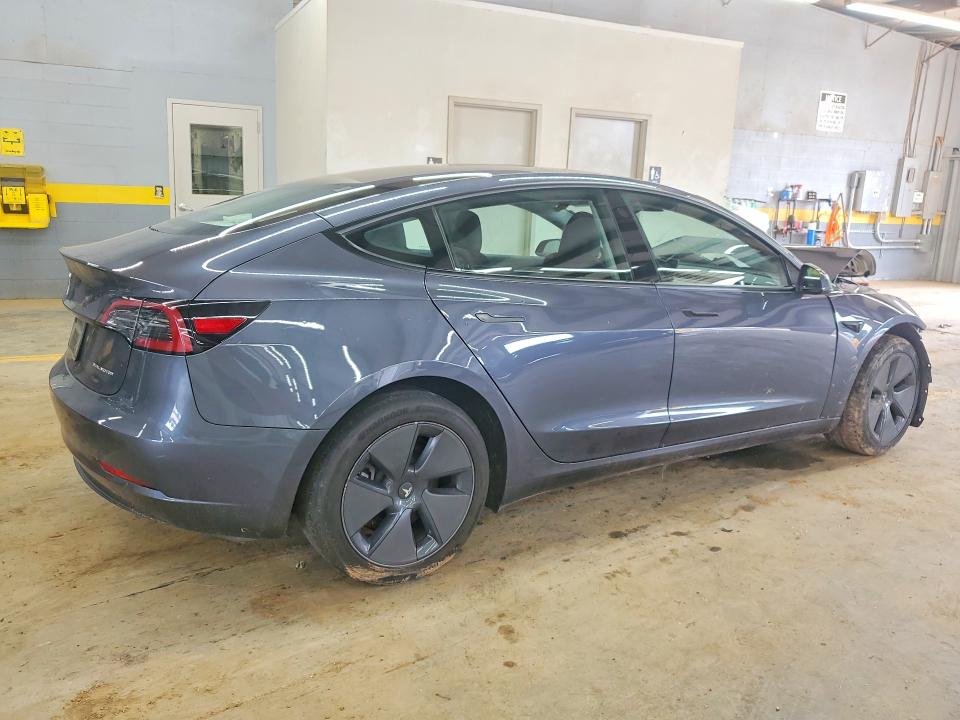 Photo 3 from auction – 2023 TESLA MODEL 3 with VIN 5YJ3E1EB5PF663056