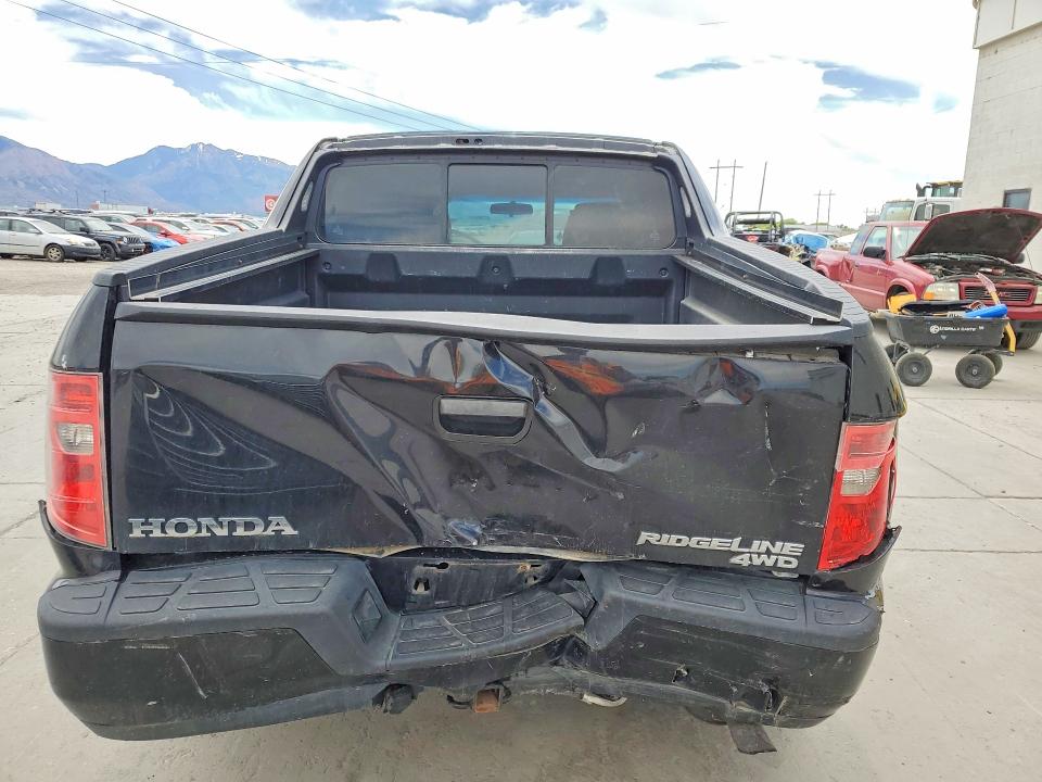 Photo 6 from auction – 2011 HONDA RIDGELINE with VIN 5FPYK1F28BB451880
