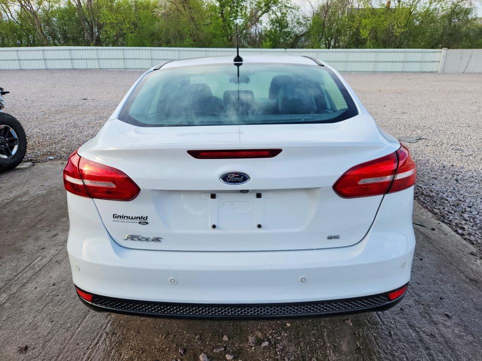 Photo 6 from auction – 2016 FORD FOCUS with VIN 1FADP3F25GL299720