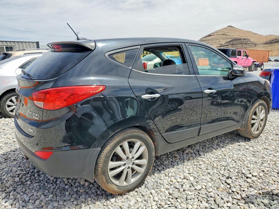 Photo 3 from auction – 2011 HYUNDAI TUCSON with VIN KM8JUCAC2BU312122