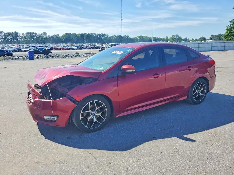 FORD FOCUS 2015 with VIN 1FADP3F29FL338727 - Photo from auction