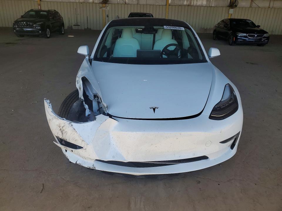 Photo 5 from auction – 2018 TESLA MODEL 3 with VIN 5YJ3E1EB0JF101248