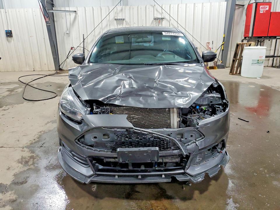 Photo 5 from auction – 2015 FORD FOCUS with VIN 1FADP3L96FL356054