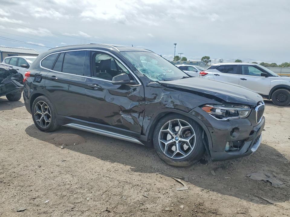 Photo 4 from auction – 2017 BMW X1 with VIN WBXHT3C31H5F77643