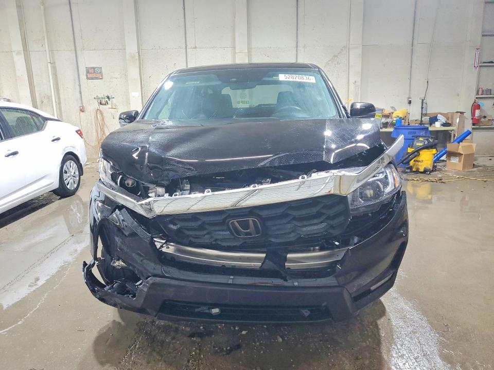 Photo 5 from auction – 2023 HONDA PASSPORT with VIN 5FNYF8H57PB003991
