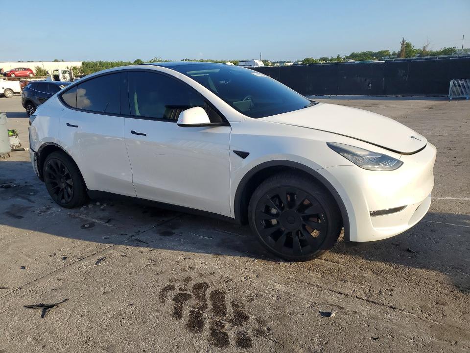 Photo 4 from auction – 2021 TESLA MODEL Y with VIN 5YJYGDED6MF122631