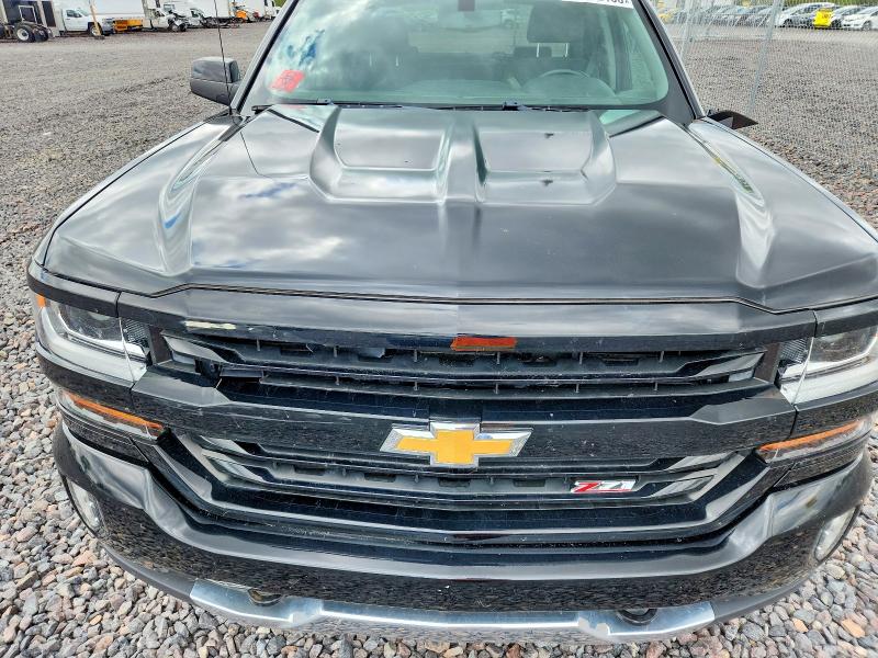 Photo 11 from auction – 2018 CHEVROLET SILVERADO with VIN 3GCUKREC8JG394217