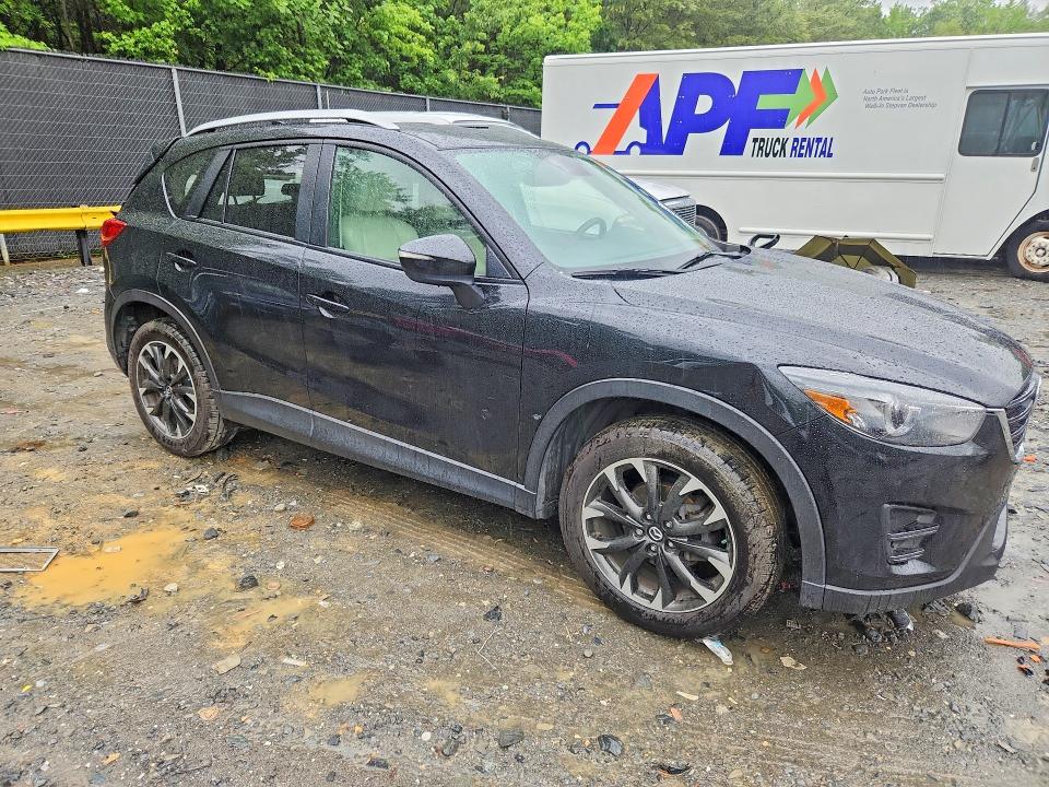 Photo 4 from auction – 2016 MAZDA CX-5 with VIN JM3KE4DY6G0604395