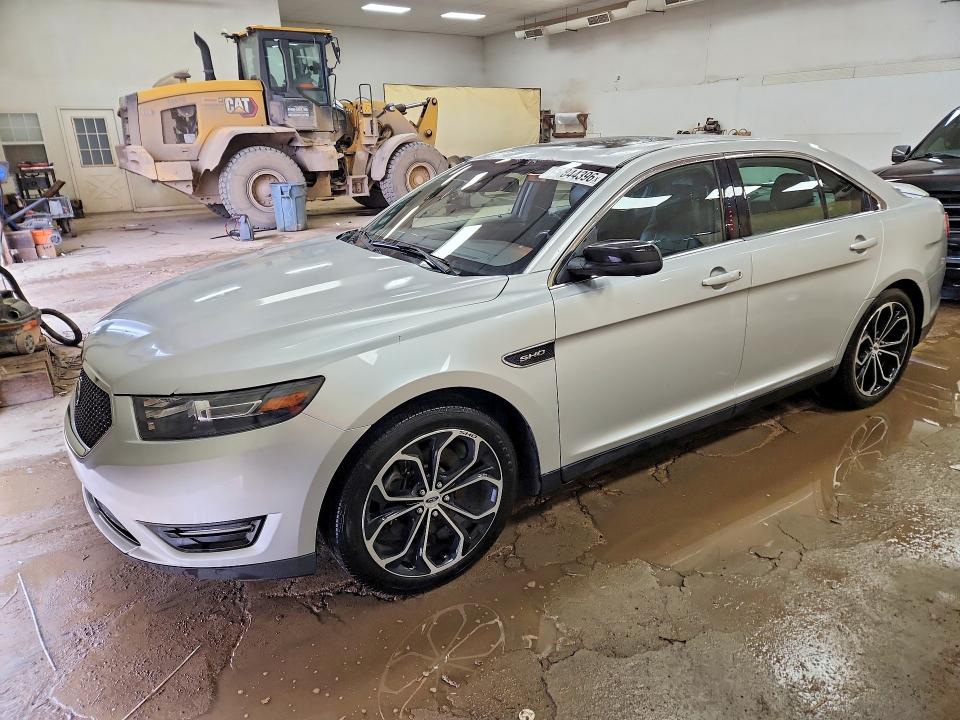 FORD TAURUS 2018 with VIN 1FAHP2KTXJG119741 - Photo from auction