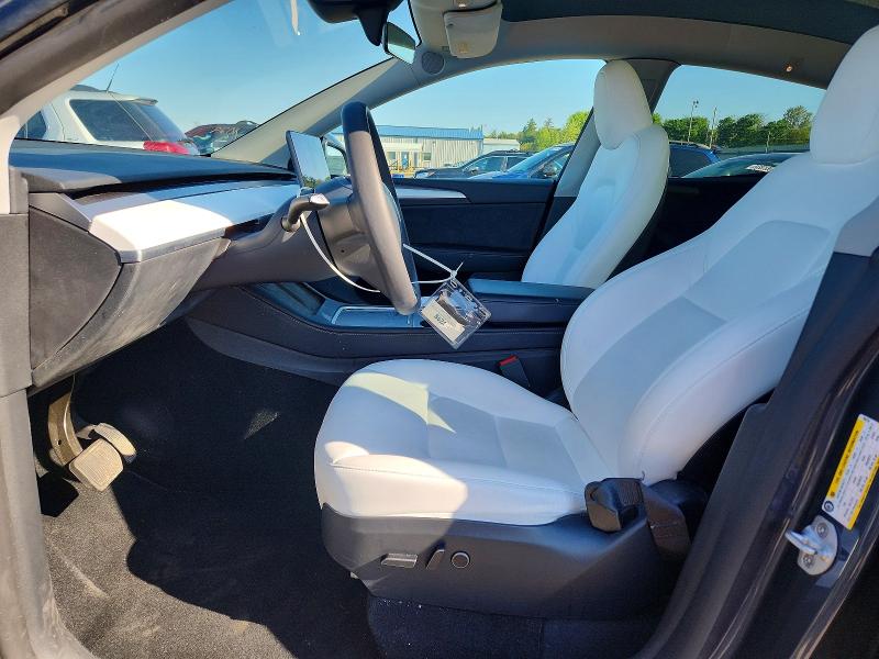 Photo 7 from auction – 2023 TESLA MODEL Y with VIN 7SAYGDEE4PF832210
