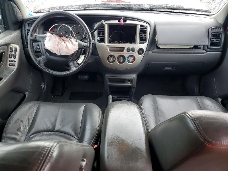 Photo 8 from auction – 2004 MAZDA TRIBUTE with VIN 4F2CZ06174KM12588