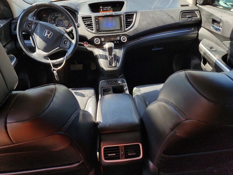 Photo 8 from auction – 2015 HONDA CR-V with VIN 2HKRM4H76FH600389